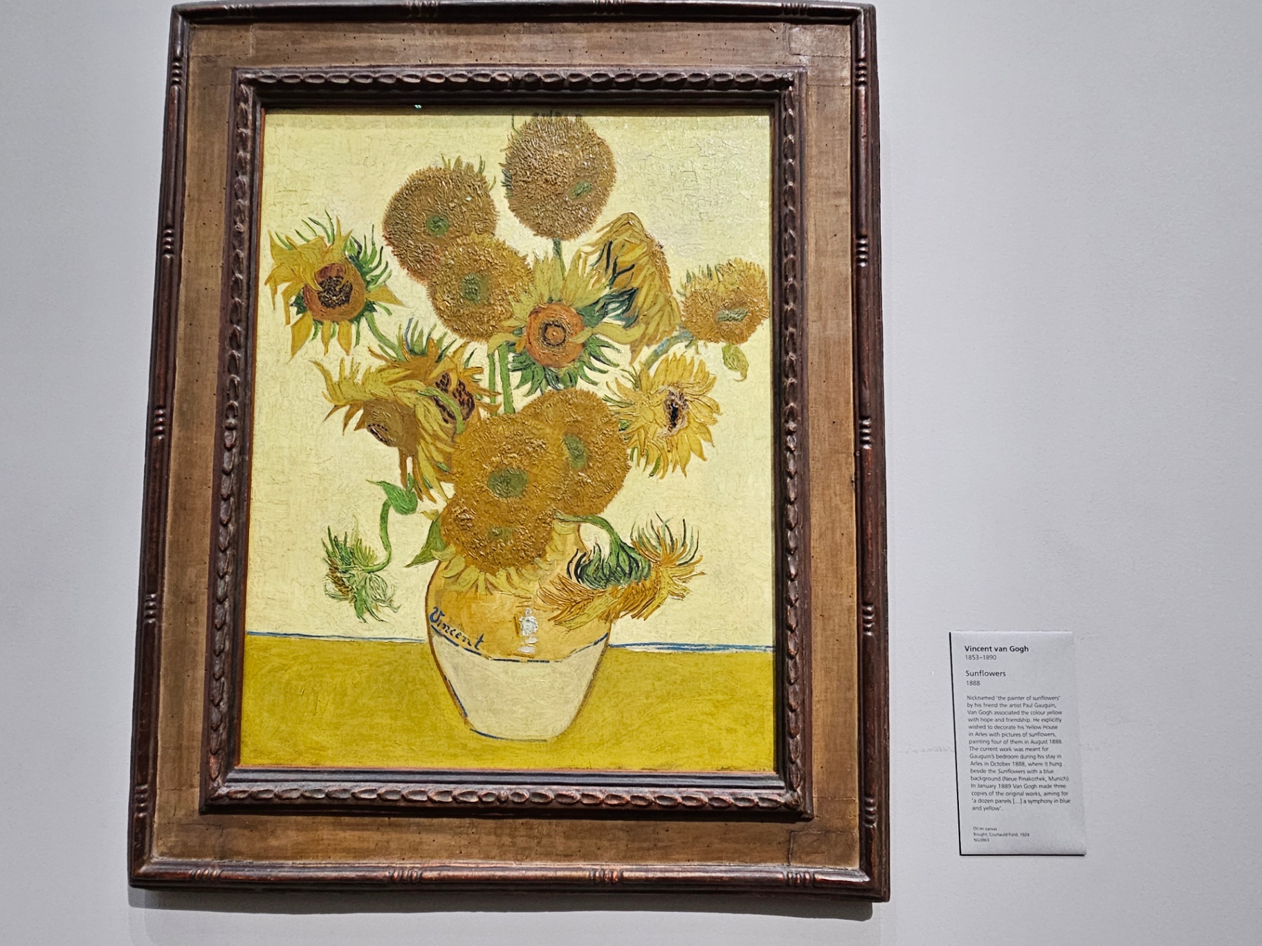 Vincent van Gogh's Sunflowers displayed in a museum