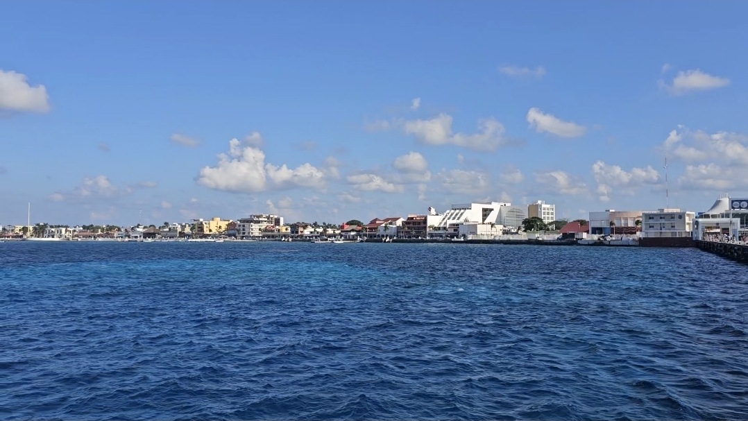 The Cozumel waterfront seen across deep blue water