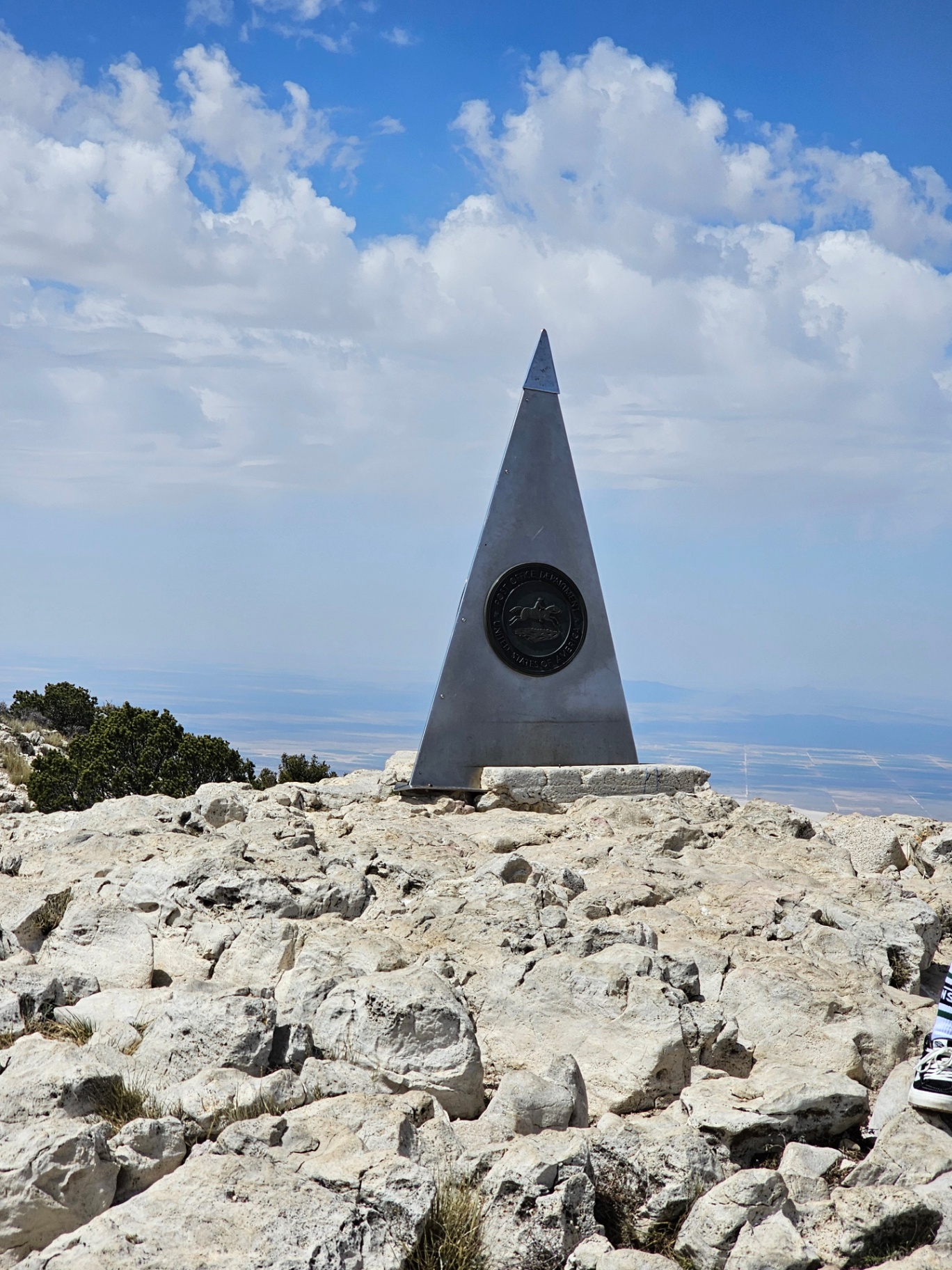 Guadalupe Peak summit monument under a big sky